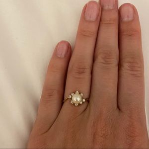 Gold Ring. Pearl Center with Diamonds Surrounding